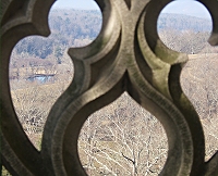 This is a view of the valley as seen through the hand-carved limestone porch railing. Click for bigger photo