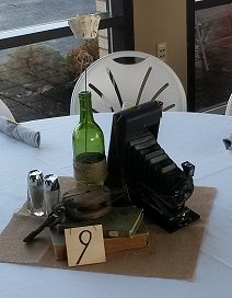 Here's a vintage camera being used as a decoration on a wedding reception table.  Click for bigger photo.