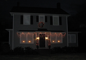 Our home for almost thirty years, lit for Christmas. Click for bigger photo