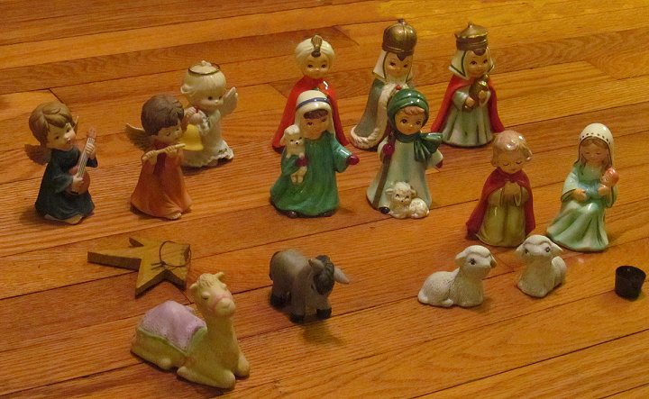 The pieces of our first nativity set, followed by new annual additions. Click for bigger photo.